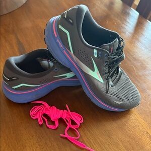 Black and Blue Athletic Shoes with Pink Accents